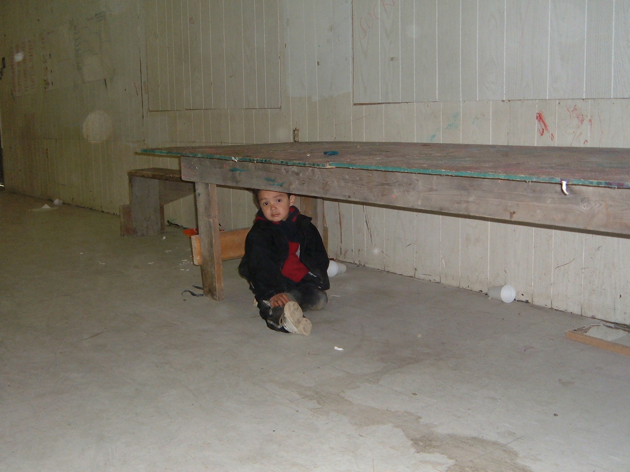 Little tyke under the table