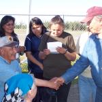 Our Chief Isaac Linklater, shakes Bob's hand.