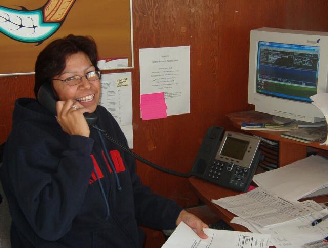 And at the Band Office, Donna Campbell
poses for a picture with her new IP
phone.