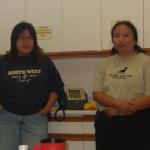Lunch Program, the two cooks pose for a picture, Melody Campbell, and, 
Beverly Mamakeesic.