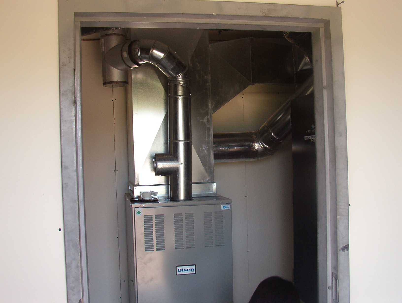 The furnace room, on KiHS side.