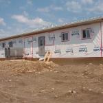 A picture taken of the back of the 
new building for KiHS, and the 
E-Centre.