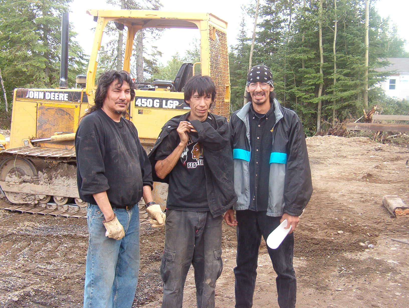 Morris Rae, Johnny Meekis, (Workers at the site) and Economic Development worker, Bobby Rae.