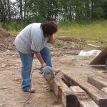 This young lady, has special talents.
She is a mother, and a hard worker.  See her holding the skill saw??  She is "Amazin