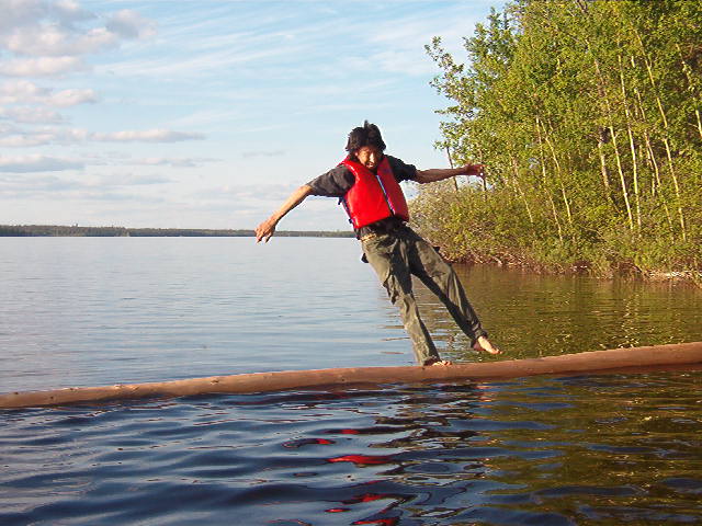 Bruce Rae.  And into the water he goes, backwards...