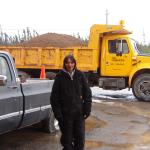 Eileen Keewaykapow, taking training on the sand packer.