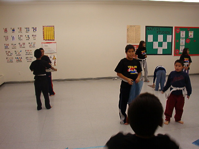 Here you see the little dude reentering the class with a bow.