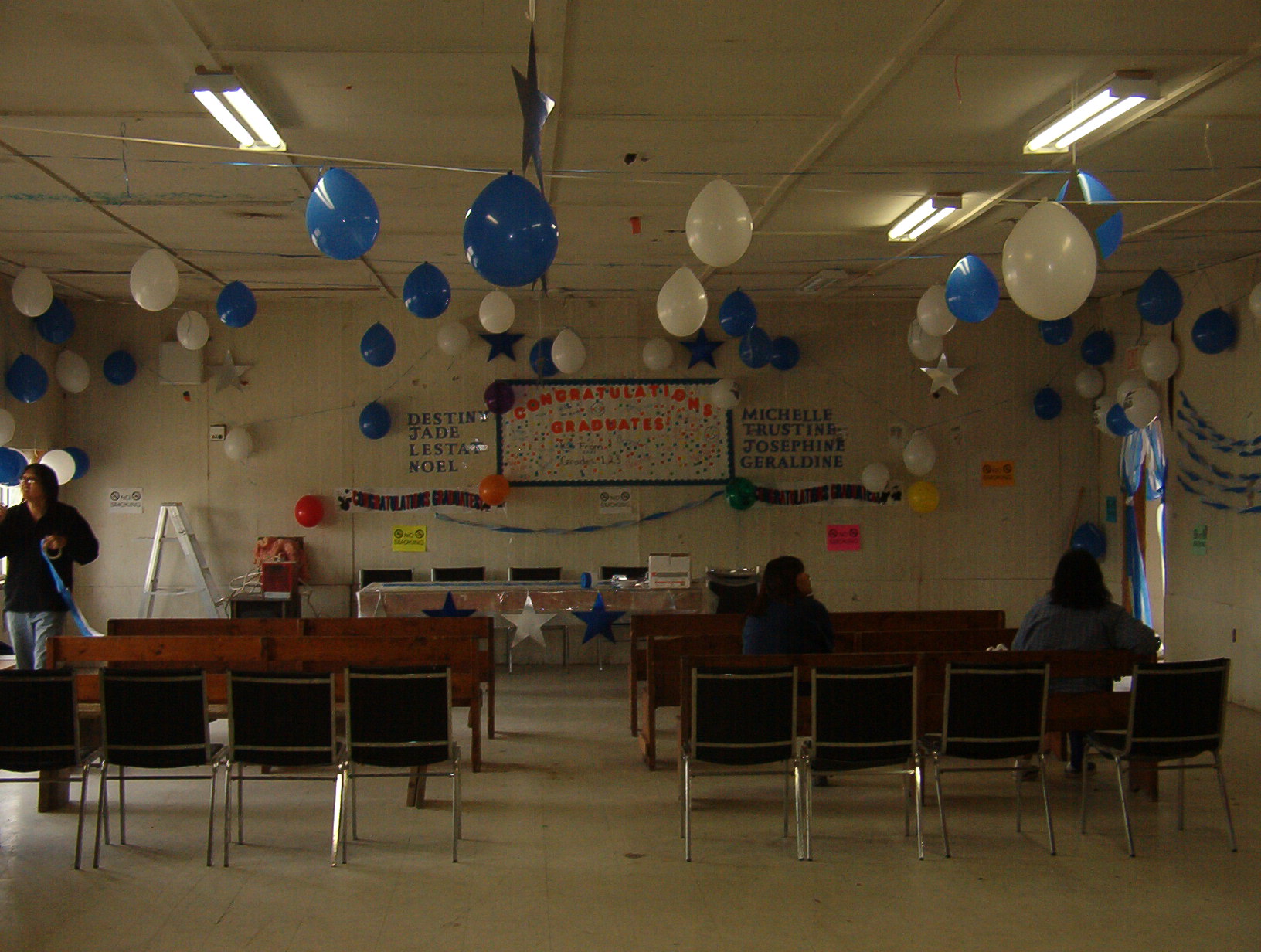 Here you see that they(school staff/students) have decorated the community hall for this event.