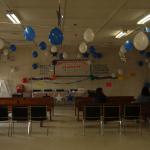 Here you see that they(school staff/students) have decorated the community hall for this event.