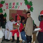 Santa opening his gift 