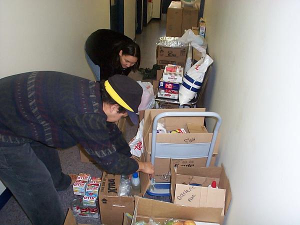 Here's our computer techy. and CAP worker organizing the feast selection.