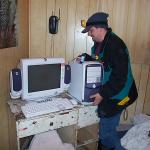 Hugh, Charlisa and Darlene went to Patrick Kakegamick place to hook his computer to the internet from his home.