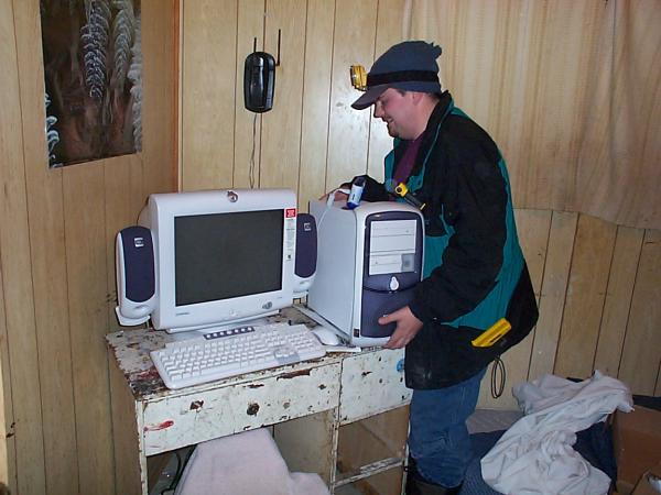 Hugh, Charlisa and Darlene went to Patrick Kakegamick place to hook his computer to the internet from his home.