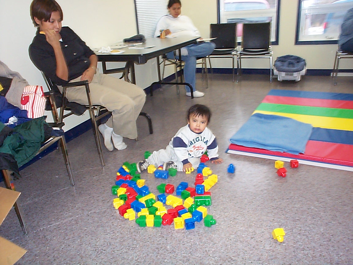 Our youngest one who came to the clinic, Jamie Rae and babysitter 
Nasen Kakegamic.