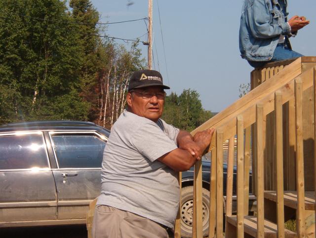 Beno Rae, my father in law, who is building the log cabin.  He is also one of our elders, in the community.