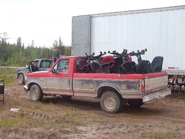 View from the side of the truck with the stack of chairs.